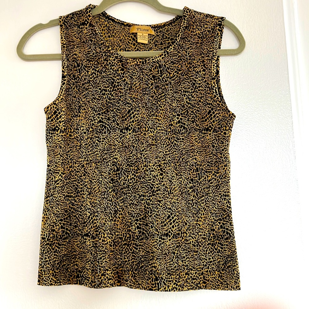 Perfect black-and-gold shell top.  Size S.  Like new.  21 inch long.
